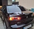 Черный Мицубиси Лансер, объемом двигателя 1.5 л и пробегом 260 тыс. км за 7000 $, фото 1 на Automoto.ua