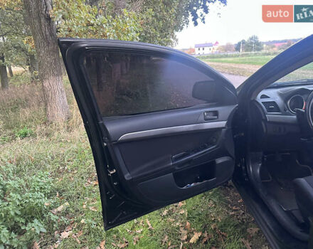 Черный Мицубиси Лансер, объемом двигателя 1.5 л и пробегом 202 тыс. км за 6500 $, фото 23 на Automoto.ua