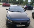 Черный Мицубиси Лансер, объемом двигателя 1.5 л и пробегом 196 тыс. км за 5800 $, фото 1 на Automoto.ua