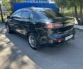 Чорний Міцубісі Lancer, об'ємом двигуна 1.5 л та пробігом 150 тис. км за 6999 $, фото 2 на Automoto.ua