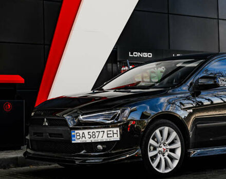 Чорний Міцубісі Lancer, об'ємом двигуна 2 л та пробігом 204 тис. км за 9500 $, фото 52 на Automoto.ua