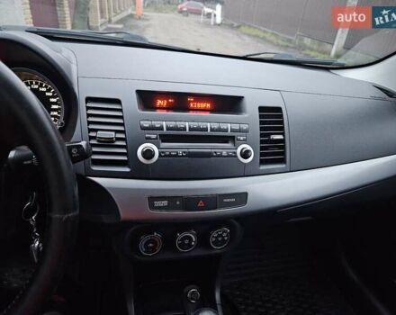 Черный Мицубиси Лансер, объемом двигателя 1.5 л и пробегом 222 тыс. км за 4900 $, фото 28 на Automoto.ua