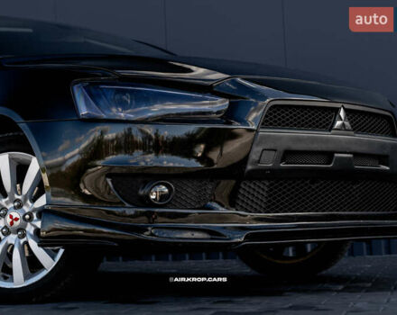 Чорний Міцубісі Lancer, об'ємом двигуна 2 л та пробігом 204 тис. км за 9500 $, фото 10 на Automoto.ua