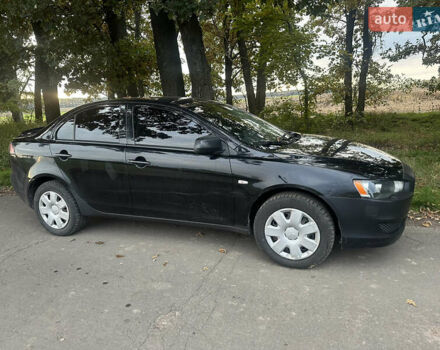 Черный Мицубиси Лансер, объемом двигателя 1.5 л и пробегом 202 тыс. км за 6500 $, фото 3 на Automoto.ua