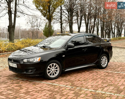 Черный Мицубиси Лансер, объемом двигателя 2 л и пробегом 169 тыс. км за 6800 $, фото 10 на Automoto.ua