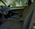 Черный Мицубиси Лансер, объемом двигателя 1.5 л и пробегом 90 тыс. км за 8499 $, фото 7 на Automoto.ua