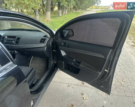 Черный Мицубиси Лансер, объемом двигателя 1.5 л и пробегом 202 тыс. км за 6500 $, фото 22 на Automoto.ua