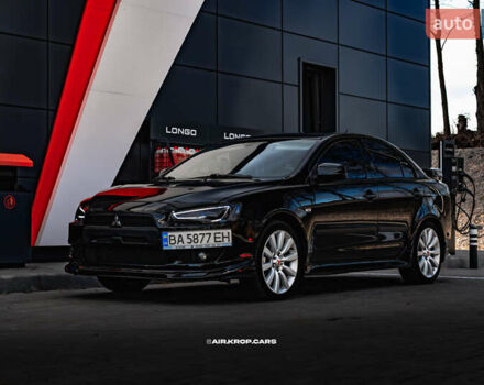 Чорний Міцубісі Lancer, об'ємом двигуна 2 л та пробігом 204 тис. км за 9500 $, фото 51 на Automoto.ua