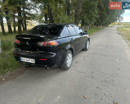 Черный Мицубиси Лансер, объемом двигателя 1.5 л и пробегом 202 тыс. км за 6500 $, фото 5 на Automoto.ua