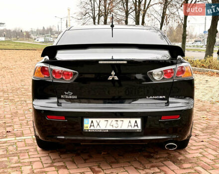 Черный Мицубиси Лансер, объемом двигателя 2 л и пробегом 169 тыс. км за 6800 $, фото 7 на Automoto.ua
