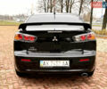 Черный Мицубиси Лансер, объемом двигателя 2 л и пробегом 169 тыс. км за 6800 $, фото 7 на Automoto.ua