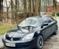 Чорний Міцубісі Lancer, об'ємом двигуна 1.6 л та пробігом 73 тис. км за 8500 $, фото 1 на Automoto.ua