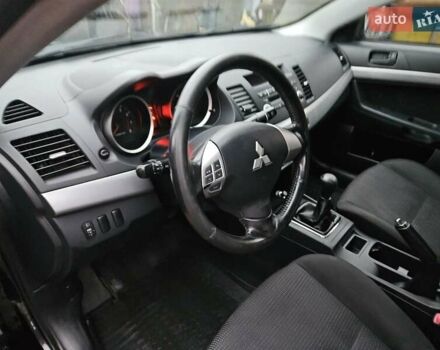 Черный Мицубиси Лансер, объемом двигателя 1.5 л и пробегом 222 тыс. км за 4900 $, фото 21 на Automoto.ua