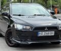 Черный Мицубиси Лансер, объемом двигателя 1.5 л и пробегом 186 тыс. км за 7500 $, фото 1 на Automoto.ua