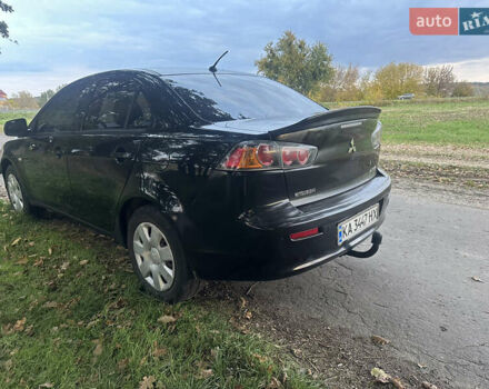 Черный Мицубиси Лансер, объемом двигателя 1.5 л и пробегом 202 тыс. км за 6500 $, фото 14 на Automoto.ua