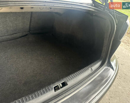 Черный Мицубиси Лансер, объемом двигателя 1.5 л и пробегом 202 тыс. км за 6500 $, фото 46 на Automoto.ua