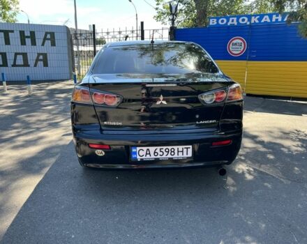 Чорний Міцубісі Lancer, об'ємом двигуна 1.5 л та пробігом 150 тис. км за 6999 $, фото 9 на Automoto.ua