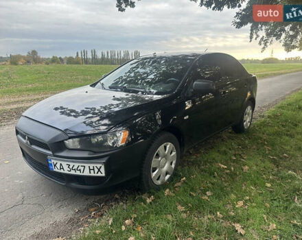 Черный Мицубиси Лансер, объемом двигателя 1.5 л и пробегом 202 тыс. км за 6500 $, фото 7 на Automoto.ua