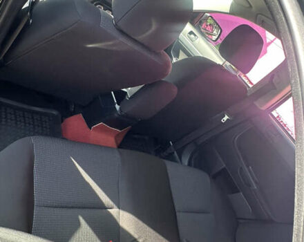 Черный Мицубиси Лансер, объемом двигателя 2 л и пробегом 158 тыс. км за 10800 $, фото 5 на Automoto.ua