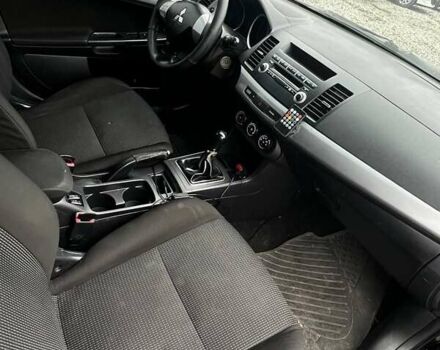 Черный Мицубиси Лансер, объемом двигателя 1.5 л и пробегом 250 тыс. км за 4800 $, фото 4 на Automoto.ua