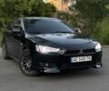 Чорний Міцубісі Lancer, об'ємом двигуна 2 л та пробігом 150 тис. км за 7815 $, фото 1 на Automoto.ua