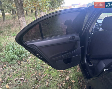 Черный Мицубиси Лансер, объемом двигателя 1.5 л и пробегом 202 тыс. км за 6500 $, фото 24 на Automoto.ua