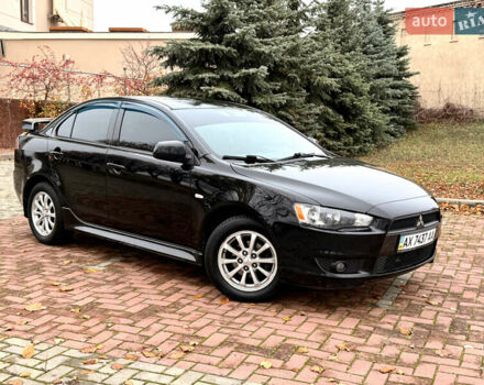 Черный Мицубиси Лансер, объемом двигателя 2 л и пробегом 169 тыс. км за 6800 $, фото 20 на Automoto.ua