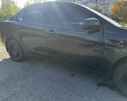 Черный Мицубиси Лансер, объемом двигателя 1.5 л и пробегом 239 тыс. км за 4300 $, фото 15 на Automoto.ua