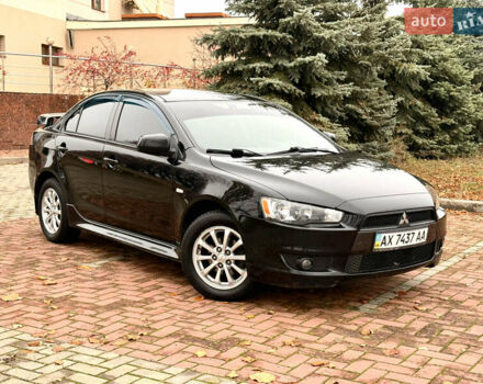 Черный Мицубиси Лансер, объемом двигателя 2 л и пробегом 169 тыс. км за 6800 $, фото 19 на Automoto.ua