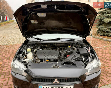 Черный Мицубиси Лансер, объемом двигателя 2 л и пробегом 169 тыс. км за 6800 $, фото 30 на Automoto.ua