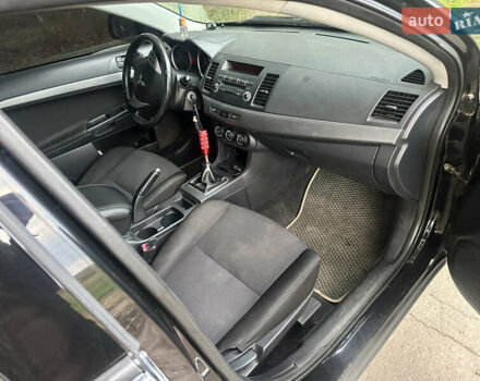 Черный Мицубиси Лансер, объемом двигателя 1.5 л и пробегом 202 тыс. км за 6500 $, фото 30 на Automoto.ua