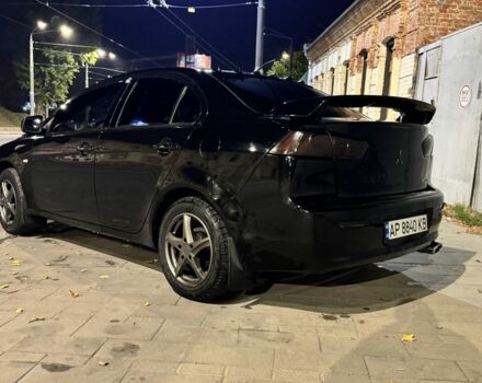 Чорний Міцубісі Lancer, об'ємом двигуна 1.5 л та пробігом 244 тис. км за 4700 $, фото 5 на Automoto.ua