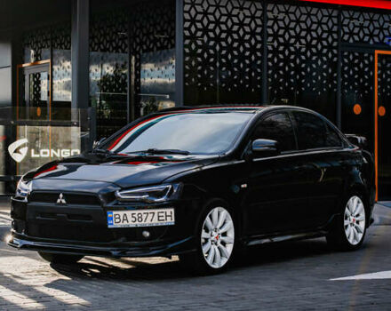 Чорний Міцубісі Lancer, об'ємом двигуна 2 л та пробігом 204 тис. км за 9500 $, фото 56 на Automoto.ua
