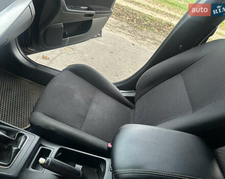 Черный Мицубиси Лансер, объемом двигателя 1.5 л и пробегом 202 тыс. км за 6500 $, фото 32 на Automoto.ua