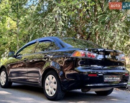 Чорний Міцубісі Lancer, об'ємом двигуна 1.5 л та пробігом 90 тис. км за 7699 $, фото 4 на Automoto.ua