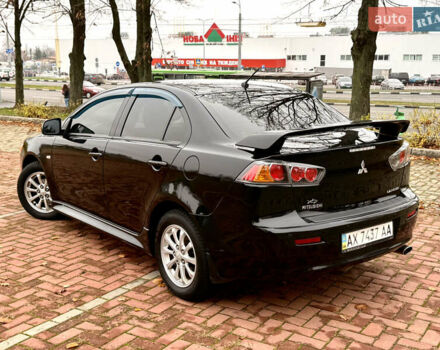 Черный Мицубиси Лансер, объемом двигателя 2 л и пробегом 169 тыс. км за 6800 $, фото 17 на Automoto.ua