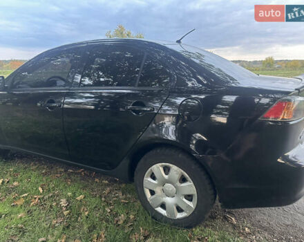 Черный Мицубиси Лансер, объемом двигателя 1.5 л и пробегом 202 тыс. км за 6500 $, фото 10 на Automoto.ua