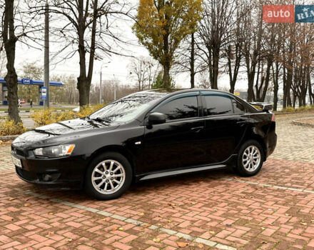 Черный Мицубиси Лансер, объемом двигателя 2 л и пробегом 169 тыс. км за 6800 $, фото 9 на Automoto.ua