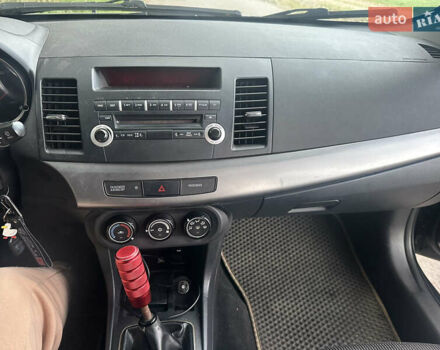 Черный Мицубиси Лансер, объемом двигателя 1.5 л и пробегом 202 тыс. км за 6500 $, фото 37 на Automoto.ua