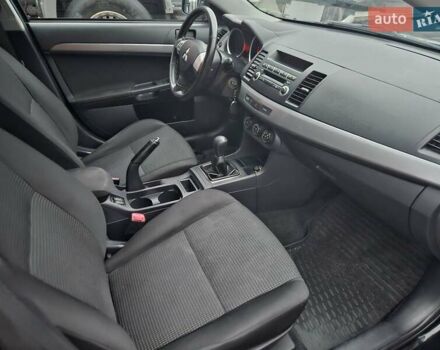 Черный Мицубиси Лансер, объемом двигателя 1.5 л и пробегом 222 тыс. км за 4900 $, фото 11 на Automoto.ua