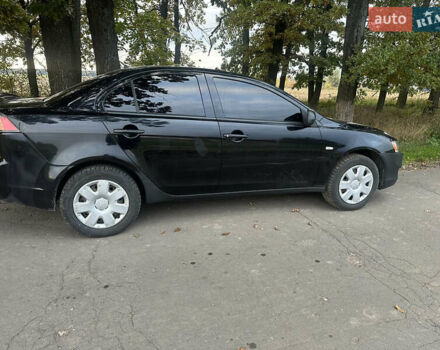 Черный Мицубиси Лансер, объемом двигателя 1.5 л и пробегом 202 тыс. км за 6500 $, фото 6 на Automoto.ua