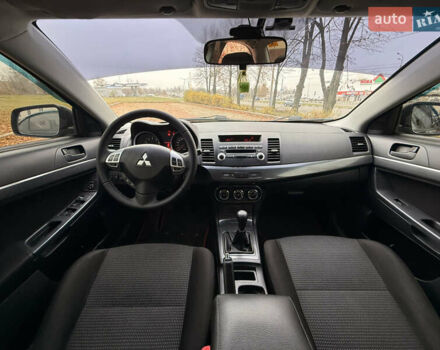 Черный Мицубиси Лансер, объемом двигателя 2 л и пробегом 169 тыс. км за 6800 $, фото 34 на Automoto.ua