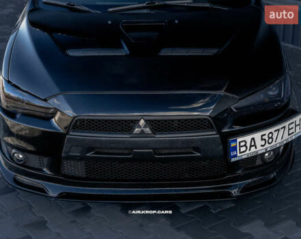 Чорний Міцубісі Lancer, об'ємом двигуна 2 л та пробігом 204 тис. км за 9500 $, фото 13 на Automoto.ua