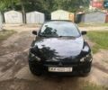 Черный Мицубиси Лансер, объемом двигателя 2 л и пробегом 106 тыс. км за 7500 $, фото 1 на Automoto.ua