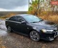 Чорний Міцубісі Lancer, об'ємом двигуна 1.5 л та пробігом 197 тис. км за 7500 $, фото 1 на Automoto.ua