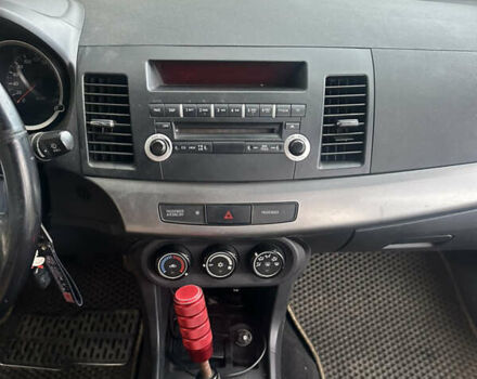 Черный Мицубиси Лансер, объемом двигателя 1.5 л и пробегом 202 тыс. км за 6500 $, фото 40 на Automoto.ua