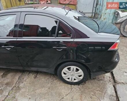 Черный Мицубиси Лансер, объемом двигателя 1.5 л и пробегом 222 тыс. км за 4900 $, фото 4 на Automoto.ua