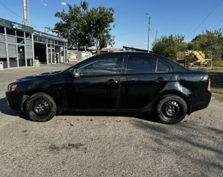 Черный Мицубиси Лансер, объемом двигателя 1.5 л и пробегом 239 тыс. км за 4300 $, фото 8 на Automoto.ua