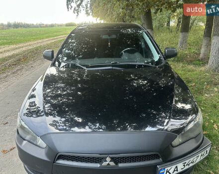 Черный Мицубиси Лансер, объемом двигателя 1.5 л и пробегом 202 тыс. км за 6500 $, фото 16 на Automoto.ua