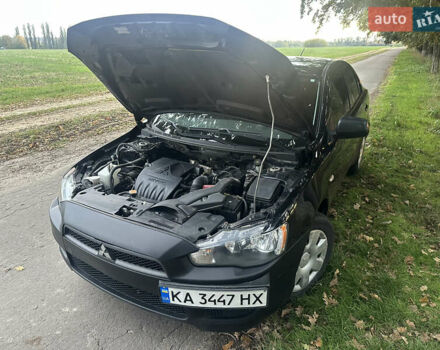 Черный Мицубиси Лансер, объемом двигателя 1.5 л и пробегом 202 тыс. км за 6500 $, фото 43 на Automoto.ua